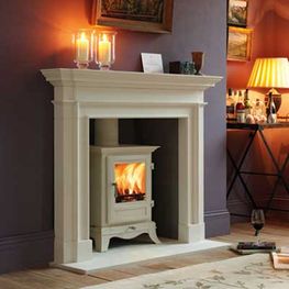 White fireplace and stove installed in a Meath home