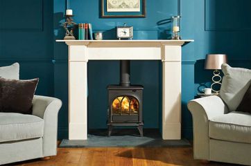 Stove installed in a marble fireplace