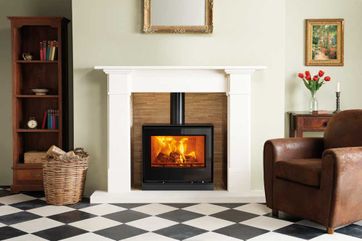 Stove installed in a marble fireplace