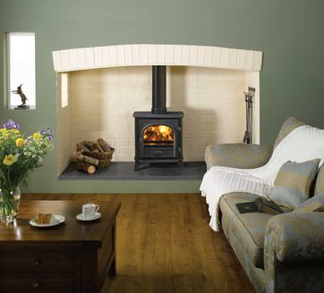 Stove installed in a beautiful modern fireplace