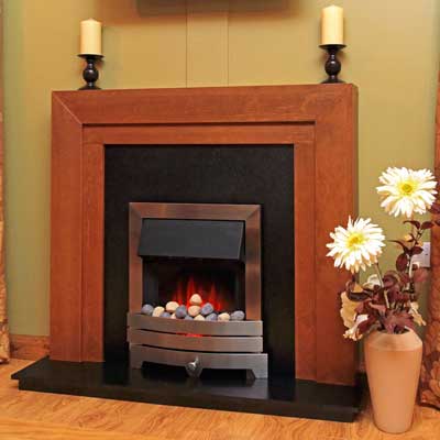 electric fire installed inside a wooden fireplace in a Meath Home